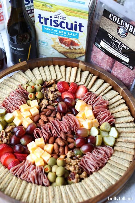 Charcuterie Board with salami, Triscuit crackers, cheese and fruit Super Bowl Meat And Cheese Tray, Charcuterie Board Ideas With Sandwiches, Simple Cute Charcuterie Board, Chip And Dip Charcuterie Board Ideas, Simple Round Charcuterie Board, Cracker And Cheese Charcuterie Board, Easy Chacutery Boards Diy, Charcuterie Small Bites, Charcuterie Board Set Up Ideas