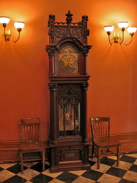 A grandfather clock Gothic Grandfather Clock, Wooden Clock Design, Old Grandfather Clock, Gothic Revival Furniture, Outside House Decor, Clock Old, Antique Grandfather Clock, Cotton Gin, Wooden Clocks