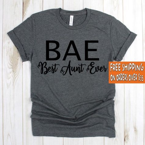 #clothing #unisexadultclothing #topstees #auntgift #pregnancyshirt #auntshirt #giftforsister #auntiegift #auntieshirt #bestauntieshirt #bestauntiegift #bestauntieever #bestauntever #newauntiegift #newauntieshirt #giftfornewaunt #auntie #auntshirts #babyshark Funny Grandma Shirts, Quotes For Shirts, Best Aunt Ever, Aunt Shirt, Aunt T Shirts, Aunt Life, Gift For Aunt, Auntie Shirts, Best Aunt