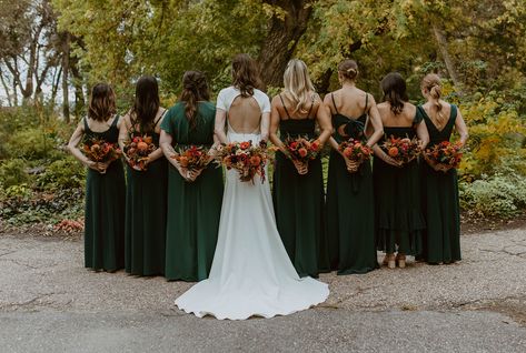 Fall Wedding Flowers With Emerald Green Dresses, Fall Wedding Bouquets Emerald Green, Fall Wedding Green Bridesmaid, Dark Green Floral Bridesmaid Dresses, Dark Green Bridesmaid Dresses Fall, Fall Wedding Emerald Green, Emerald Green Bridesmaid Dresses Fall, Green Bridesmaid Dresses Orange Flowers, Emerald Green Bridesmaid Dresses With Colorful Flowers