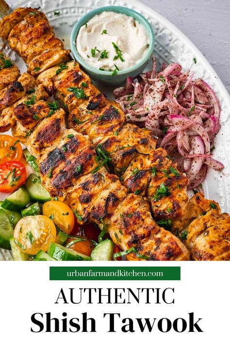 This Authentic Shish Tawook recipe is so delicious and versatile that I guarantee you’ll add it to your summer grilling rotation. But guess what? You can make it in the cooler months too in an oven or on a grill pan. A staple at most Middle Eastern restaurants, there’s no reason for you not to make it at home! Shush Tawook Recipe, Chicken Shish Tawook Recipe, Middle Eastern Kabob Recipes, Middle Eastern Chicken Recipes, Sfeeha Recipe, Shish Tawook Recipe, Arabian Cuisine, Persian Dishes, Turkish Recipe