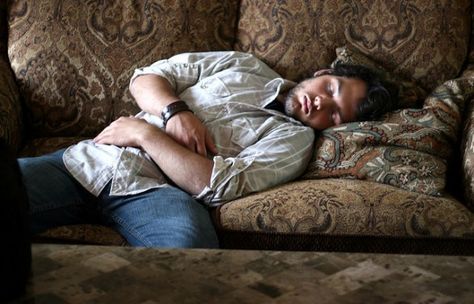 Article: A quick guide to better sleep for tired couples. Man Sleeping On Couch, Sleeping Couch, Sleeping On The Couch, Man Sleeping, Dream Studies, Sleeping Pose, Stages Of Sleep, Moving To Seattle, Adequate Sleep