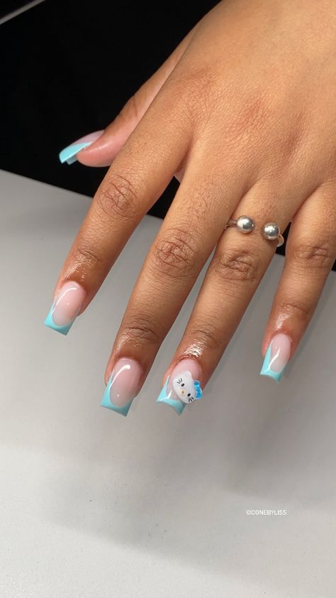 French Tip Nails Bule, Blue Nails Hello Kitty, Light Blue Hello Kitty Nails, Light Blue Nails With Design Short, Black And Blue Nails Short, Nails 2024 Blue, Baby Blue Acrylic Nails Short, Hello Kitty Nails Acrylic Short, Blue French Tip Nails With Design