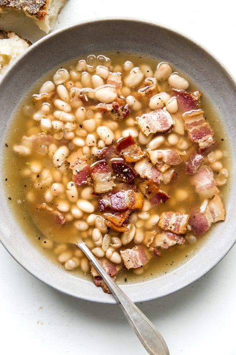 Creamy and deeply savory, it’s hard to believe that this rich and hearty white bean soup with bacon is made from just five simple ingredients. Bean Soup With Bacon, Soup With Pesto, Soup With Bacon, White Bean Soup Recipes, The Modern Proper, Modern Proper, Fall Soup, Bacon Soup, Fall Soup Recipes