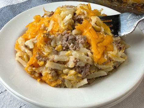 A classic hot dish loaded with cheddar this Cheesy Ground Beef Hashbrown Casserole recipe is delicious and popular. Ground Beef Hashbrown Casserole, Ground Beef Hashbrown, Beef Hashbrown Casserole, Beef Hashbrown, Slow Cooker Hamburger Hash, Hamburger Hashbrown Casserole, Hamburger Hashbrown, Cottage Cheese Dip Recipes, Cheesesteak Casserole