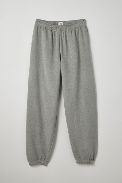 Sweatpants by the essential BDG label in a soft French terry fabrication & available in a range of go-to colors. Relaxed silhouette with gathered elastic ankle cuffs and a stretch elastic waistband. Fitted with side and back pockets. Urban Outfitters exclusive.Features. Soft French terry sweatpants from BDG Classic silhouette Stretch elastic waistband Front & back pockets Content + Care. 80% Cotton, 20% polyester Machine wash Imported Size + Fit. Model in Dark Green is 6'2" and wearing size Medi Mens Grey Sweatpants, Joggers Grey, Baggy Sweatpants, Grey Sweats, Sweatpants Outfit, Grey Sweatpants, Grey Joggers, Tracksuit Bottoms, Jogger Sweatpants