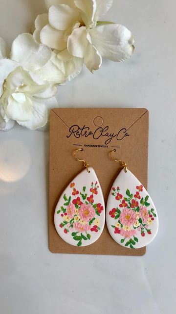 Polymer Clay Earrings on Instagram: "💐Calling all brides and floral lovers! I am going to be adding custom painted bouquets to the shop. These are such a sweet way to remember your wedding bouquet and would make a very special gift to surprise someone with. I’m also hoping to add more custom options soon. Stay tuned! 💐 . . . . #polymerclayearrings #clayearrings #clayearringscollection #handpaintedearrings #handpaintedjewelry #artreels #reelsinstagram #trendingreels #trendingaudio #customjewelr Polymer Clay Wedding, Painted Polymer Clay, Custom Bouquet, Hand Painted Earrings, Painted Earrings, Hand Painted Jewelry, Earrings Polymer Clay, Polymer Clay Charms, Wedding Anniversary Gift