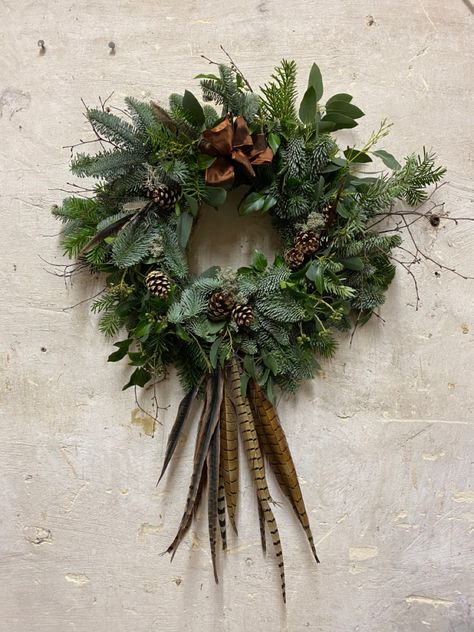 Feather Wreath Ideas, Wreath With Feathers, Pheasant Wreath, Christmas Wreaths With Feathers, Christmas Tree Pheasant Feathers, Christmas Feather Wreath, Pheasant Feather Wreath Diy, Pheasant Feather Wreaths, Pheasant Feather Wreath