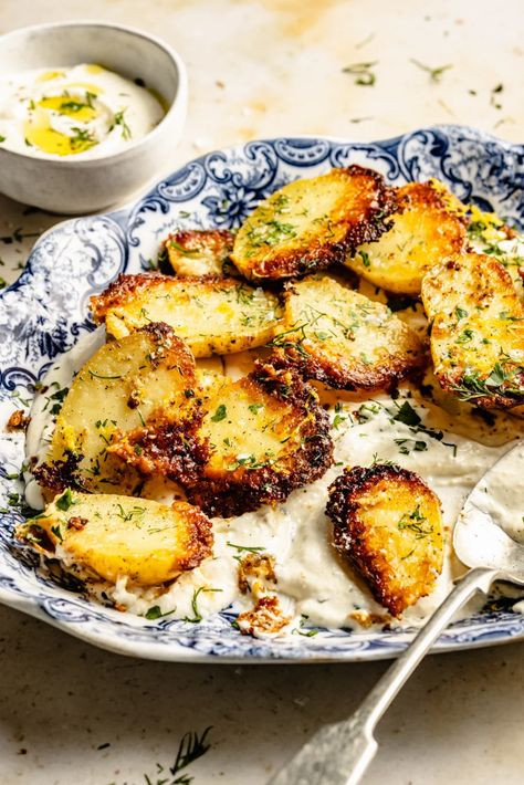 Easy, crispy parmesan roasted potatoes with fresh lemon and herbs. Serve these savory parmesan potatoes with an incredible roasted garlic feta dip alongside your favorite mains and proteins! The perfect side dish for any dinner table. Garlic Feta Dip, Feta Potatoes, Crispy Roasted Potatoes, Sunday Roast Dinner, Tahini Sauce Recipe, Garlic Parmesan Potatoes, Parmesan Roasted Potatoes, Pistachio Pesto, Potato Dinner