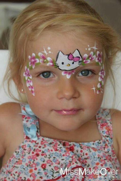 Hello kitty Hello Kitty Face Paint, Face Painting Images, Face Painting Flowers, Kitty Face Paint, Christmas Face Painting, Cheek Art, Girl Face Painting, Face P, Face Paint Makeup