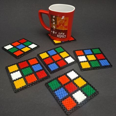 Perler Beads Coasters. Rubik's Cube. Set of 6 Coasters #BeadingPatterns #BeadPatternIdeas #PerlerBeadPatternsIdeas #SimplePerlerBeadPatternsIdeas Perler Coasters Pattern, Easy Perler Bead Patterns Simple, Perler Beads Coasters, Perler Bead Coaster, Perler Bead Coasters, Maple Jewelry, Perler Coasters, Hama Beads Coasters, Wine Cover