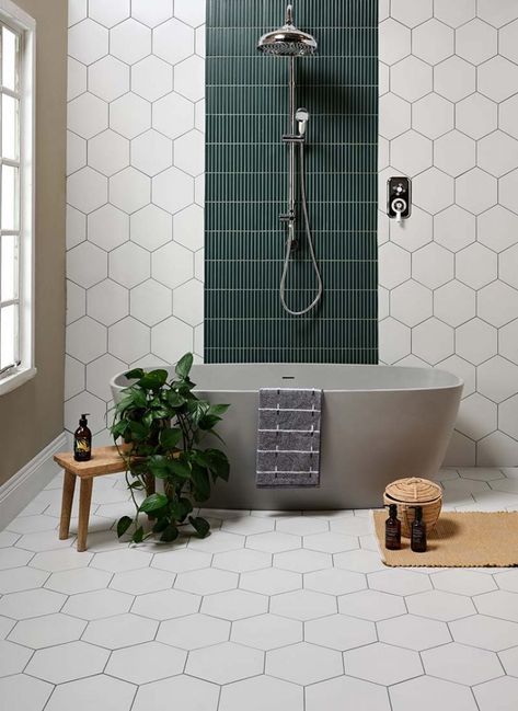 #bathroomshower #freestandingbath #showerbath #dreambathroom #bathroomdecor #storageideas #lighting #lightingideas #bathroomlighting #smallbathroom #familybathroom #bathroomstorage #kbbmag Hexagon Floor Tiles, Porcelain Hexagon Tile, Hexagon Floor, Cool Color Palette, Kitchen Splashback, Pine Floors, Hexagon Tiles, Bathroom Floor Tiles, Porcelain Mosaic