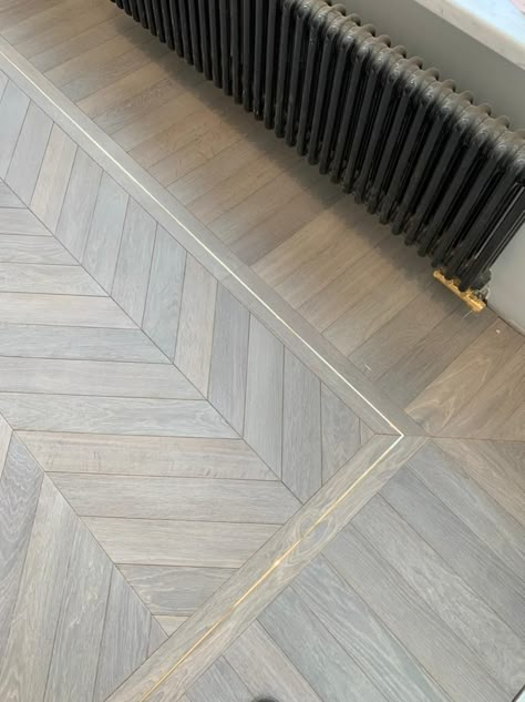 Wood Floor Foyer Design, Wood Flooring Layout Pattern, Parquet Flooring Entryway, Hardwood Herringbone Floor, Herringbone Wood Floor With Gold Trim, Double Herringbone Wood Floor, Tile That Compliments Wood Floors, Antico Flooring, Transition Strip Ideas Floors