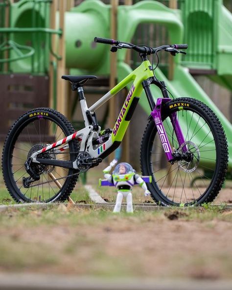 Santa Cruz Bicycles on Instagram: "Bike Check: Trail Vision Lightyear Bronson Definitely one of the most entertaining custom builds we’ve seen to date💥 • - Frame: Santa Cruz Bronson MX - Size: Large - Color: Space Ranger  - Shock: @rockshox Super Deluxe Ultimate, 150mm - Fork: @rockshox Zeb Ultimate, 160mm - Drivetrain: @srammtb X0 AXS Transmission - Brakes: @srammtb Code Ultimate - Rotors: @srammtb H2S 220mm front/200mm rear - Headset: @canecreek 40 - Hubs: @industry_nine Hydra - Rims: @reservewheels 30|HD Carbon 29/27.5 - Tire F: @maxxisbike Minion DHF 29”x2.5” - Tire R: @maxxisbike Minion DHR II 27.5”x2.4” - Saddle: @wildernesstrailbikes Silverado - Seatpost: @rockshox Reverb AXS - Bar/Stem: @santacruzbicycles Carbon Riser, 800mm - Pedals: @crankbrothers Mallet Enduro - Grips: @racefac Santa Cruz V10, Santa Cruz Bronson, Santa Cruz Bicycles, Space Ranger, Bike Mountain, Hanuman Photos, Mtb Bike Mountain, Nice Cars, Mtb Bike