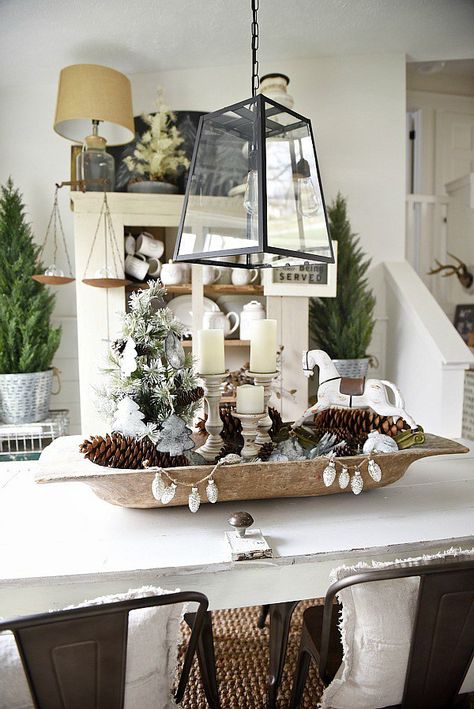 Rustic Christmas dough bowl centerpiece - See this neutral rustic Christmas decor & get inspired by the cottage style decor. Christmas Dough Bowl, Homemade Christmas Table Decorations, Dough Bowl Centerpiece, Bowl Decor, Kitchen Table Centerpiece, Bowl Centerpiece, Christmas Dining Table, Bread Bowl, Wooden Dough Bowl