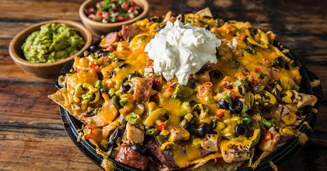 Ultimate Loaded Nachos Loaded Nachos Recipe, Bbq Nachos, Pulled Pork Leftover Recipes, Traeger Grill Recipes, Pulled Pork Leftovers, Loaded Nachos, Pellet Grill Recipes, Traeger Recipes, Pellet Grills