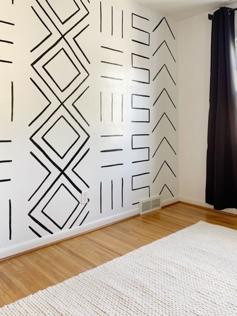 Using leftover paint to create my own accent wall. Painted Pattern Walls Diy, Fun Paint Pattern Wall, Washi Tape Accent Wall Diy, Simple Paint Patterns Accent Walls, Painting Lines On Walls Ideas, Focal Wall Paint Ideas, Tape Patterns For Painting Wall, African Accent Wall, Black White Accent Wall