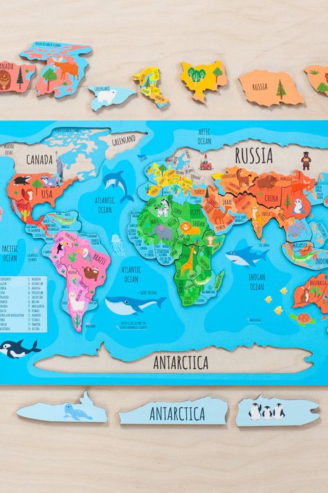 Introducing our World Map Kids Jigsaw Puzzle, a captivating and educational toy designed to spark curiosity and inspire young minds. This wooden Montessori puzzle introduces children to the wonders of geography and the diversity of our world. It is a perfect gift for toddlers and preschoolers who are eager to explore and learn. World Map Puzzle, Geography For Kids, Kids World Map, Map Puzzle, Handmade Baby Toys, Puzzle For Kids, Montessori Educational Toys, Jigsaw Puzzles For Kids, Wooden Map