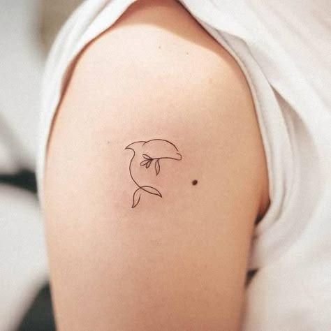 #tattoo #handtattoo #tattoos Dolphin Tattoo Behind Ear, Dainty Dolphin Tattoo, Dolphin Tale Tattoo, Fine Line Dolphin Tattoo, Dolphin Tattoos For Women, Simple Dolphin Tattoo, Minimalist Dolphin Tattoo, Ocean Minimalist Tattoo, Dolphin Tattoos