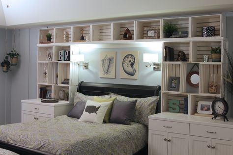 Every once in a while we do a project that has us wondering, “why the heck haven’t we tried this before!” and using craft crates to make DIY built-in shelves was one of those projects!  I think I said 250 times, “This is so stinkin’ easy!” This project was part of our coastal bedroom makeover...Read More » Shelves Over Bed, Overbed Storage, Bedroom Bookshelves, Shelf Bedroom, Amazing Bedroom Designs, Bookshelves In Bedroom, Small Bedroom Storage, Headboard With Shelves, Headboard Ideas