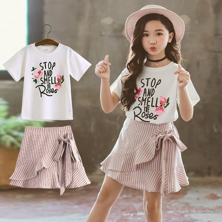 Toddler Girls Summer Clothes Kids Floral Print T Shirt Short Sleeve Tops Striped Mini Skirts 2Pcs Outfits Features: Material: Cotton Blend. Soft fabric, comfortable, breathable, wearable, not fade shrink, no pilling, no deformation, easy to clean. Soft and skin-friendly fabric girl clothing suitable for girl casual wear, and outdoor wear. Great gift for your princess. Great for summer daily wear, family gatherings, vacation, beach, street photograph, party, picnic, birthday or other festivals. The cloths have the prints of letters top and the striped skirt,that will let your girls more fashional and beautiful. Package include:1PC Top+1PC Skirt Product Description: Season:Spring,Summer Pattern type:Prints Gender:Girls Sleeve type: Short Sleeve SizeSuitable ageSuitable age toBustTop LengthSk Kids Summer Outfits Girls, Kids Summer Fashion Girl, Toddler Girl Outfits Summer, Girls Summer Clothes, Beach Street, Toddler Girl Summer, Toddler Girl Shorts, Picnic Birthday, Girl Sleeves