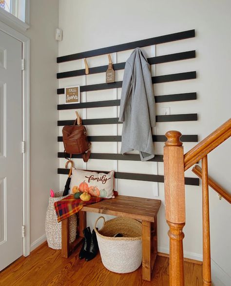 Coat Rack Wall Entryway, Black Tile Fireplace, Laundry Room/mud Room, Build A Fireplace, Modern Coat Rack, Mud Room Storage, Builder Grade, Black Tiles, Coat Rack Wall