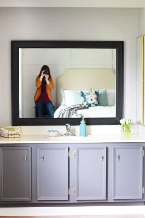 Learn how to make a DIY framed mirror for your bathroom in just a few easy steps! | #bathroom #diy #framedmirror #bathroommirror Adding A Frame To A Bathroom Mirror, Frame Bathroom Mirror Diy, Diy Framed Mirror, Diy Mirror Frame Bathroom, Bathroom Mirrors Diy, Bathroom Mirror Frame, Mirror Frame Diy, Bathroom Diy, Big Mirror