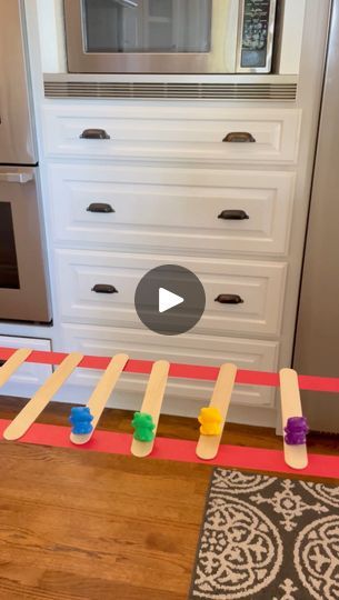 34K views · 568 reactions | Have you tried our viral tape bridge activity yet? If not, this is your sign! 

All you need is painters tape, craft sticks, and little figures to balance. It’s the cutest and most engaging STEM challenge for preschoolers and elementary school kids. It works on concentration, critical thinking skills, motor skills, and more. 

You can leave it open-ended or give your child a more specific challenge like: 

✨How many bears can you fit on one craft stick? 
✨Make a bridge to balance all the bears using the least amount of sticks as possible. 
✨What other items can you find around the house that you can balance? 
✨ Where else do you think you could create this tape bridge? 

Save this to try and come back for more STEM activity ideas!❤️ | Brittany Bacharach | gnarly Little Figures, Science Week, Stem Challenge, Stem Activity, Craft Sticks, Stem Challenges, Language Activities, Critical Thinking Skills, Activity Ideas