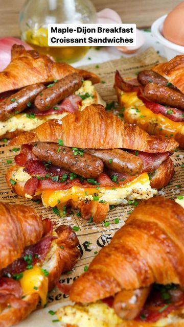 Lauren Sephton | Bright Moment Co. on Instagram: "Let’s make Maple-Dijon Breakfast Croissant Sandwiches with soft scrambled eggs, crispy bacon, @amylufoods Breakfast Mini Links and sharp cheddar for THE breakfast of champions. 😉But in all seriousness, these breakfast sandwiches are super easy to make for the family or your next holiday brunch!   RECIPE ⬇️   Servings: 7   Ingredients: ·      1 tbsp. Honey ·      2 tbsp. Dijon Mustard ·      7 Plain Croissants ·      7 slices Sharp Cheddar Cheese ·      1 9-oz. package Amylu Breakfast Time Mini Links ·      7 large Eggs ·      1/3 cup Whole Milk ·      2 tbsp. Olive Oil ·      Salt & Black Pepper, to taste ·      7 slices Cooked Bacon ·      Fresh Chives, chopped, for garnishing   Instructions: 1.     Preheat oven to 400F. Line a large baki Croissant Egg Boats, Breakfast Mini, Croissant Sandwiches, Soft Scrambled Eggs, Egg Boats, Breakfast Croissant, Croissant Sandwich, Croissant Breakfast, Brunch Recipe