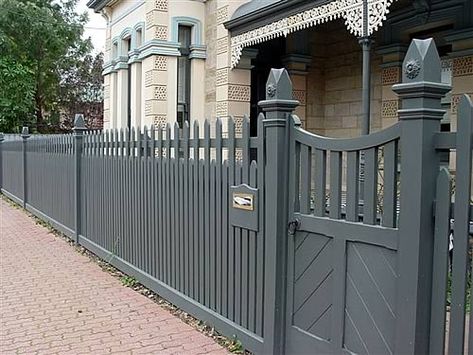 Grey Picket Fence, Tudor Style Fence, Grey Wooden Fence, Picket Fence Color Ideas, French Country Fence Ideas, Tudor Fence, Bungalow Fence, Victorian Fence, Grey Fence