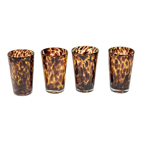 Vintage amber drinking glasses set of four highball tumbler glasses mouth-blown with exclusive tortoiseshell color flowing pattern. A distinctive tortoise shell motif brings rich color and dimension to a glass barware set that makes a stunning addition to your bar. Crafted from rich mouth-blown glass, these handmade tortoise set of 4 Handblown tortoise shell highball glasses will add depth and handsome texture to any table or bar. The beautiful amber and brown patterned glass is perfect for all Tortoise Shell Wedding Decor, Fun Shot Glasses, Tortoise Shell Decor, Flowing Pattern, Tortoiseshell Glasses, Colourful Living Room Decor, Tortoise Shell Glasses, Striped Tablecloths, Tumbler Glasses