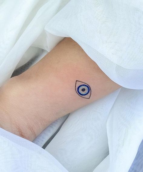 Small Evil Eye Tattoo, Cool Cross Tattoos, Cross Tattoo Meaning, Small Skull Tattoo, Unique Cross Tattoos, Hamsa Hand Tattoo, Latest Tattoo Design, Unique Small Tattoo, Evil Eye Tattoo