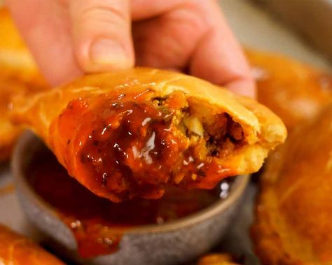 Dipping empanada in Empanada sauce Empanada Dipping Sauce Recipe, Sauce For Empanadas, Empanada Dipping Sauce, Empanada Sauce Recipe, Empanada Sauce, Homemade Empanadas, Beef Empanadas Recipe, Vegetable Sticks, Beef Empanadas