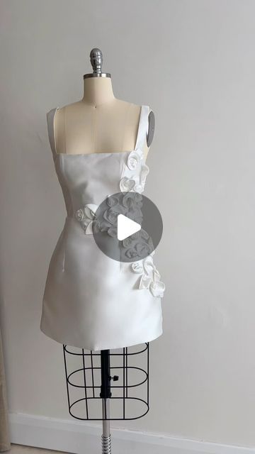 ASTON Bridal on Instagram: "BESPOKE for a bride. Inspired by an incredible dress that didn’t quite fit the brides dream vision. So we went through the process to designer what would… together. 

Remotely, back and forth to uncover what shapes this bride typically gravitates towards, what was her overall wedding vision, how did she want to look and feel on her wedding day?! 

Chic. Sophisticated. Fun. 

❤️‍🔥❤️‍🔥❤️‍🔥 A modern square neckline with a little bit of a chic chunkier strap was the perfect place to start. Combined with our signature fit, an accentuated waist and a structured hip. 

Then the cherry on top, PEARLS. Ofcourse 👏🏻🤍 

Bespoke ASTON. My favourite. These little creations will always hold the most special place in my heart. Thank you for trusting me to bring your visio White Structured Dress With Boning, White Structured Mini Dress, Staud A-line Dresses, Aston Bridal, Fitted White Staud Dress, Luxury White Staud Dress, Special Place In My Heart, Wedding Vision, Cherry On Top