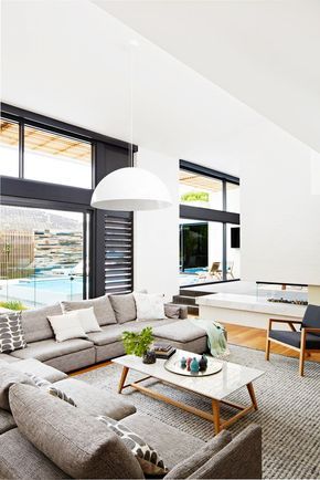 Black window frames and louvres draw all eyes to the pool. Vittoria Polo **sofa** and Sloan marble **coffee table**, both from [Globe West](http://www.globewest.com.au/?utm_campaign=supplier/|target="_blank"). Gas **fireplace** from [Real Flame](http://www.realflame.com.au/?utm_campaign=supplier/|target="_blank"). **Pendant light** from [Sonic Lighting](http://www.soniclighting.com.au/?utm_campaign=supplier/|target="_blank").: [object Object] Seaview House, Globewest Furniture, Lounge Rooms, Black Window Frames, 1960s House, Globe West, Melbourne Home, Stain Wood, 1960s Home