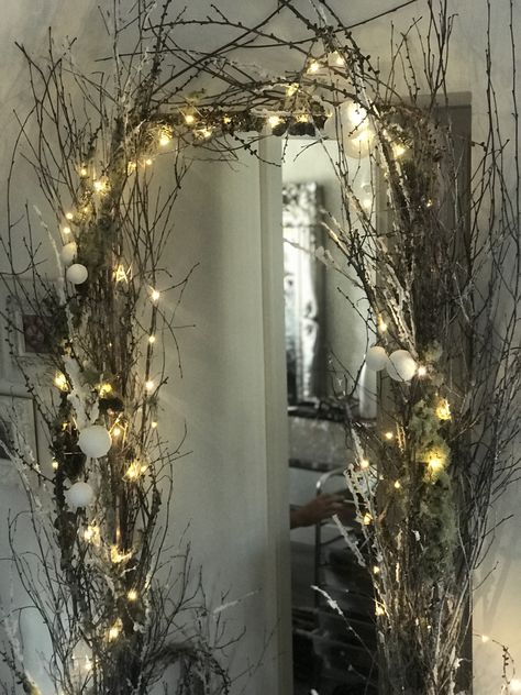 Twig archway Twigs And Branches Decor Christmas, Santas Grotto Design Ideas, Twig Archway, Tree Branch Christmas Decor, Christmas Archway Decor Indoor, Christmas Doorway, Santas Grotto, Twigs Decor, Yule Decor