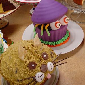 http://thepartyanimal.hubpages.com/hub/Giant-Cupcake-Birthday-Cakes Jumbo Cupcake Ideas, Big Top Cupcake, Large Cupcake Cakes, Halloween Cupcake Cake, Giant Cupcake Cake, Jumbo Cupcake, Giant Cupcake Cakes, Big Cupcake, Large Cupcake