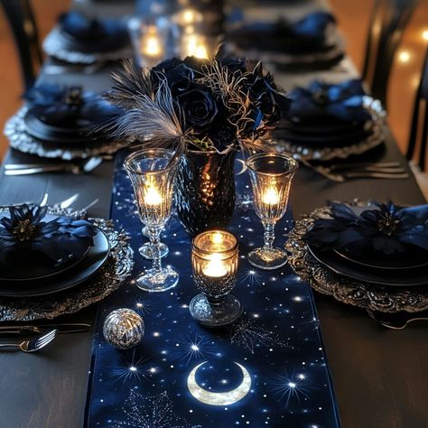 Halloween celestial dining decor made easy with a blue table runner and silver moon accents. Crystal balls, flowers, and LED candles elevate the atmosphere for Halloween. This enchanting setup offers a magical theme that enhances any spooky gathering. Blue Moon Wedding, Black And Blue Table Setting, Blue And Black Wedding Theme, Black And Blue Wedding Theme, Midnight Blue Wedding Theme, Black Blue Wedding, Celestial Goth, Night Sky Wedding, Mona Megistus