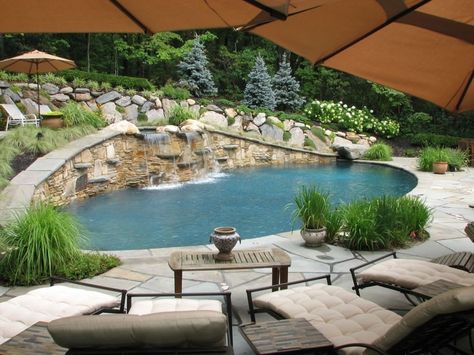 Swimming Pool Waterfall Swimming Pool Sitescapes Landscape Design Stony Brook, NY Pool Waterfall Landscaping, Sloped Backyard Ideas, Pools With Waterfalls, Hillside Pool, Waterfall Landscaping, Swimming Pool Waterfall, Sloped Backyard Landscaping, Pool Landscaping Ideas, Backyard Ideas On A Budget