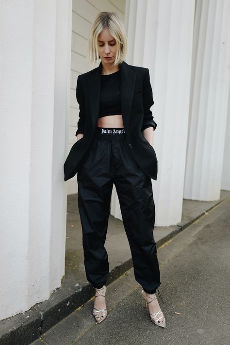 Track Pants With Heels Outfit, Track Pants And Blazer Outfit, Black Track Jacket For Spring Streetwear, Styling Track Pants Women, Trendy Black Sports Track Jacket, Classy Athleisure Outfits, Black Track Pants Outfit, Sport Pants Outfit, Black Track Pants