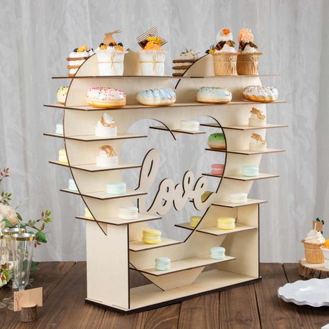 PRICES MAY VARY. Quantity: 1 Cupcake Stand Material: Wood Color: Natural Style: 8-Layer Heart-Shaped w/ Center Engraved "Love" Overall Size: 26"L x 6"W x 23"H Middle Heart Size: 13.5"L x 12"H Height Between Each Tier: 2.5" Each Panel Width: 3" (both sides) Engraved Love Size: 10"L x 6"H Base Size: 17.5"L x 5.75"W Wood Thickness: 3.5mm - 4.5mm Features: High quality laser cut wood, double sided, sturdy base, durable Assembly Required: Yes. Easy To Assemble Instructions Included: Yes PREMIUM QUALI Dessert Display Stand, Candy Stand, Cake Rack, Wooden Display Stand, Cupcake Stands, Cupcake Display, Shelf Rack, Dessert Stand, Wooden Display