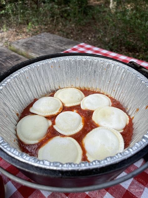 Baked Ravioli in a Dutch Oven - Amateur Camper Dutch Oven Ravioli, Glamping Kitchen, Dutch Oven Camping Recipes, Baked Ravioli, Ravioli Bake, Dutch Oven Camping, Dutch Oven Cooking, Camp Food, Dutch Oven Recipes