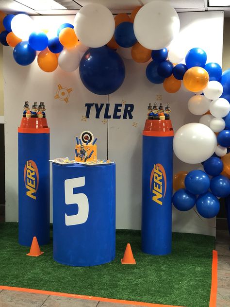 Custom Nerf backdrop and plinths Nerf Party Backdrop, Diy Birthday Party Favors, Kids Birthday Crafts, Nerf Birthday Party, Nerf Party, Boy Birthday Party Themes, Outdoor Birthday, Capture The Flag, Sunshine Birthday