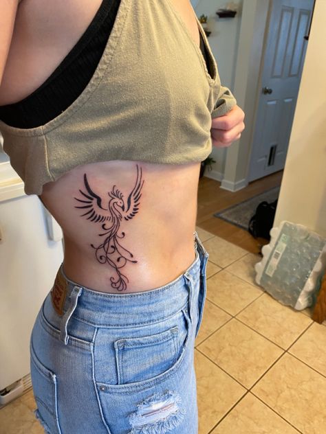 Phoenix Tattoo Side Ribs, Phoenix Tattoo Feminine Ribs, Pretty Phoenix Tattoo, Phoenix Tattoo Ribs For Women, Phoenix Rib Tattoo, Phoenix Tattoo Ribs, Phoenix Rib Tattoos For Women, Bird Tattoo Ribs, Hip Tattoo Designs