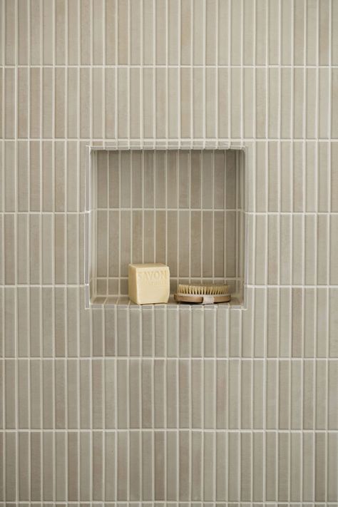 Simplicity and functionality meet in this beautiful shower niche, designed with sleek, vertical tiles in soft, neutral tones. A perfect blend of form and function, this space keeps bath essentials within easy reach while adding a touch of elegance to the primary bathroom. Ideal for those who love clean lines and minimalist design. #BathroomDesign #ShowerNiche #MinimalistBathroom #NeutralInteriors Shower Niche Vertical Tile, Niche In Shower, Vertical Tile, Park Project, Hippie Designs, Primary Bathroom, Modern Hippie, Shower Niche, Boho Interiors