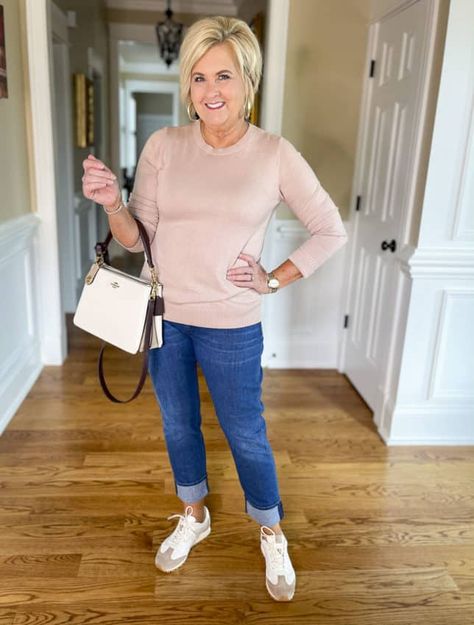 Fashion Blogger 50 Is Not Old is wearing a pale pink sweater with boyfriend jeans, Tory Burch sneakers, and a Coach handbag Blush Pink Sneakers Outfit, Coach Sneakers Outfit For Women, White Slip-on Sneakers For Light Sports In Spring, White Flat Slip-on Sneakers Casual Style, Comfortable White Slip-on Sneakers For Light Exercise, Coach Sneakers Outfit, Tory Burch Sneakers Outfit, Comfortable White Slip-on Sneakers For Walking, Casual Pink Slip-on Sneakers For Spring