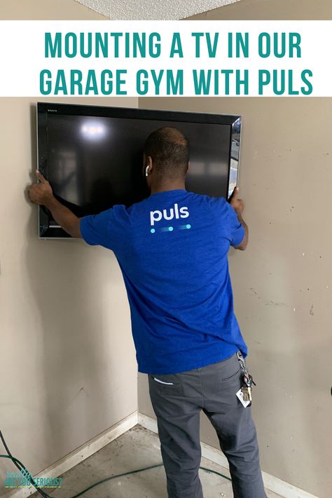 mounting a tv in our garage gym with puls #ad #garagegym #tvmount Garage Tv Ideas Mounted Tv, Where To Put A Tv In The Garage, Garage Fold Down Tv, Hanging Tv In Garage, Garage Tv Ideas, Tv In Garage, Tv In Garage Ideas, Gym Equipment Storage Wall, Mounting A Tv