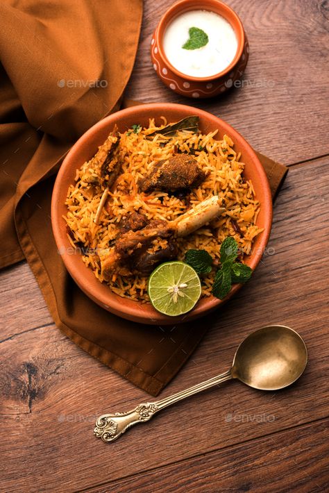 Mutton Biryani by stockimagefactory. Gosht or Lamb Biryani prepared in Basmati Rice served with Yogurt dip #Sponsored #Gosht, #Lamb, #stockimagefactory, #Mutton Biryani Presentation, Biryani Presentation Ideas, Biryani Photography, Lamb Biryani, Chicken Biryani Photography, Mutton Biryani Photography, Mutton Biriyani Photography, Chicken Biryani Photography Home, Mutton Biryani