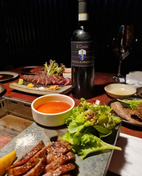 Holy Cow! This beef and wine pairing is one for the books! 🥩🍷 We went to a Yakiniku restaurant last night for steak and beef tongue. Brought a bold red wine to match. It can't get any better than Podere Il Cocco's Brunello Di Montalcino. In the glass, it’s a beautiful dark garnet red with a blossom of ripe fruits, dried flowers, and spices. - 🛒 Discover the world of Italian wines via dvintr.com (link in bio) or send us a message for orders. Yakiniku Restaurant, Italian Wines, Beef Tongue, Dark Garnet, Brunello Di Montalcino, Ripe Fruit, Garnet Red, Holy Cow, Wine Pairing