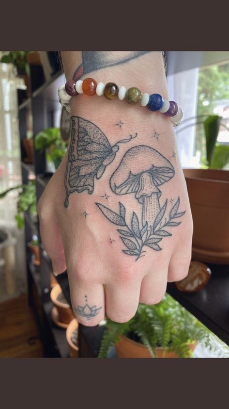 y2k butterfly aesthetic mushroom tattoo Mushroom Hand Tattoos For Women, Meaningful Color Tattoos, Mushroom Patchwork Tattoo, Mushroom And Butterfly Tattoo, Patchwork Arm Tattoo Ideas, Mushroom Butterfly Tattoo, Mushroom Hand Tattoo, Mushroom Girl Tattoo, Hippie Tattoos For Women